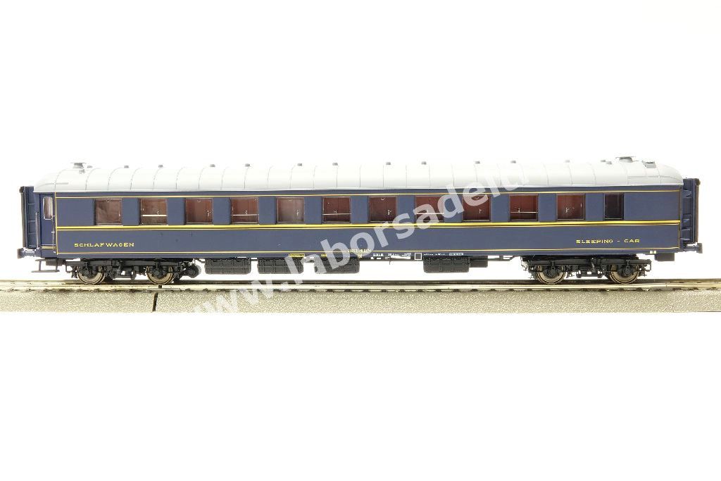 Carrozza letti FS tipo Ub, livrea blu con filetti gialli, senza logo CIWL, epoca IV