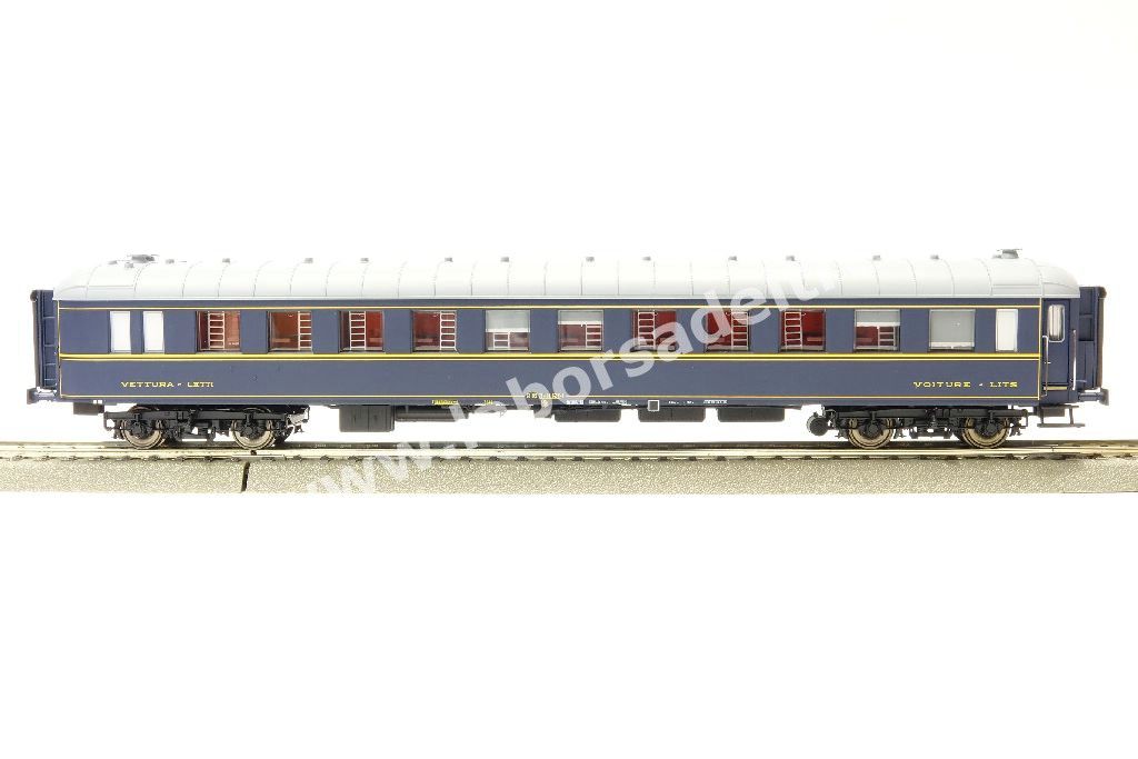 Carrozza letti FS tipo Ub, livrea blu con filetti gialli, senza logo CIWL, epoca IV