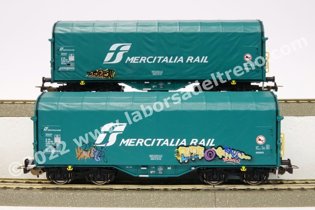 Coppia carri telonati trasporto coils FS Mercitalia Rail tipo Shimmns, livrea verde con graffiti, epoca VI